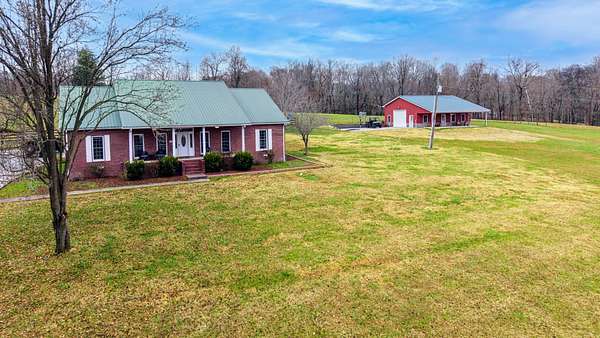 8.83 Acres of Land with Home for Sale in Vanleer, Tennessee