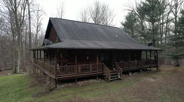 69 Acres of Recreational Land with Home for Sale in Quincy, Michigan