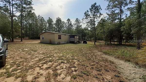 5 Acres of Residential Land with Home for Sale in Dunnellon, Florida