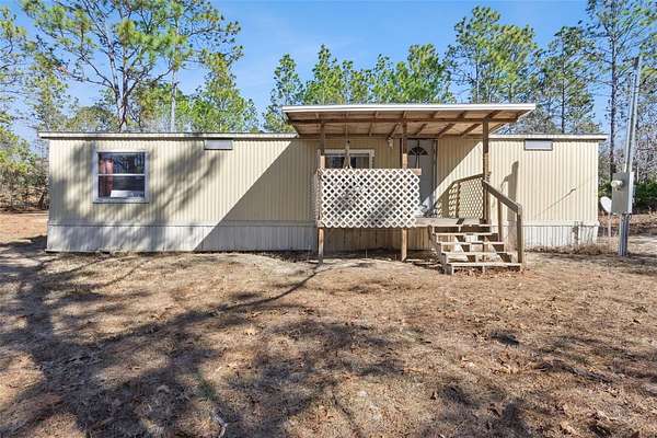 5 Acres of Residential Land with Home for Sale in Dunnellon, Florida