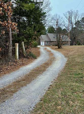 5 Acres of Land with Home for Sale in Mountain View, Arkansas