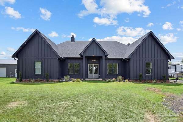 5 Acres of Residential Land with Home for Sale in Pace, Florida