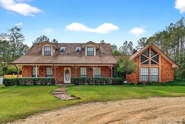 8.2 Acres of Land with Home for Sale in Picayune, Mississippi