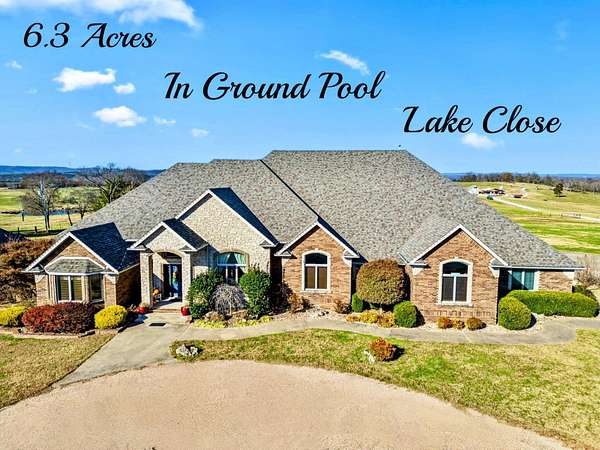 6.3 Acres of Land with Home for Sale in Golden, Missouri