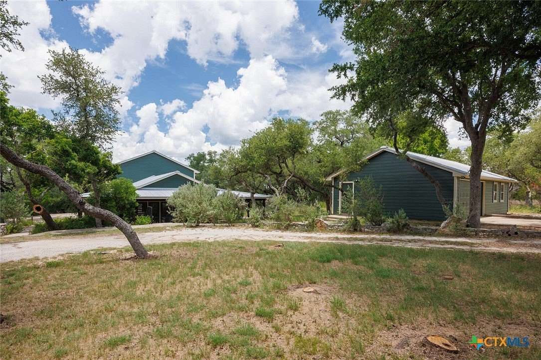 5.82 Acres of Residential Land with Home for Sale in Wimberley, Texas