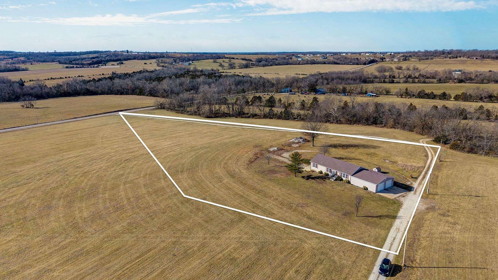 5 Acres of Residential Land with Home for Sale in Bolivar, Missouri