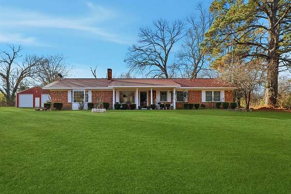 25 Acres of Land with Home for Sale in Daingerfield, Texas