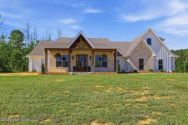 5.62 Acres of Land with Home for Sale in Madison, Mississippi