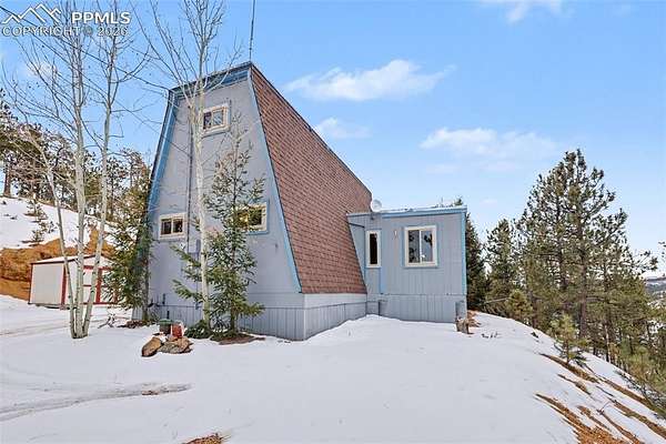 1.65 Acres of Residential Land with Home for Sale in Woodland Park, Colorado