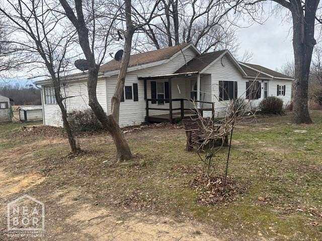 12.8 Acres of Land with Home for Sale in Wirth, Arkansas