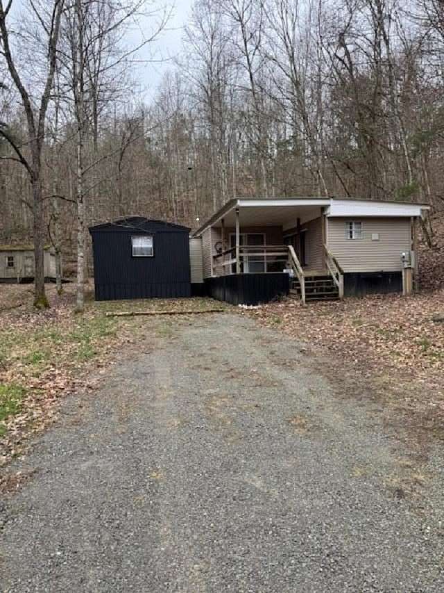 15.3 Acres of Land with Home for Sale in Columbia, Kentucky