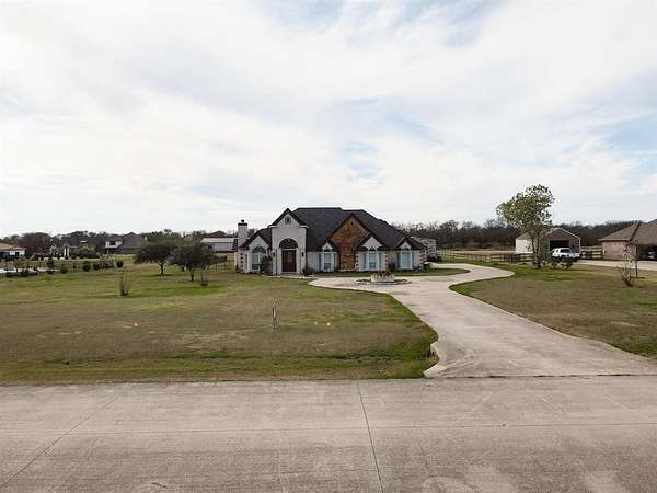 2 Acres of Residential Land with Home for Lease in Royse City, Texas