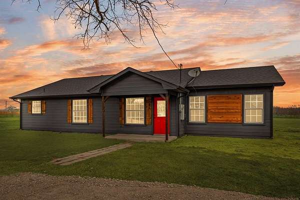 1.65 Acres of Residential Land with Home for Sale in Terrell, Texas