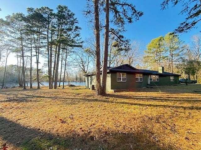 14.6 Acres of Land with Home for Sale in Clarksville, Arkansas