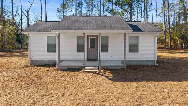2.39 Acres of Land with Home for Sale in Perry, Florida