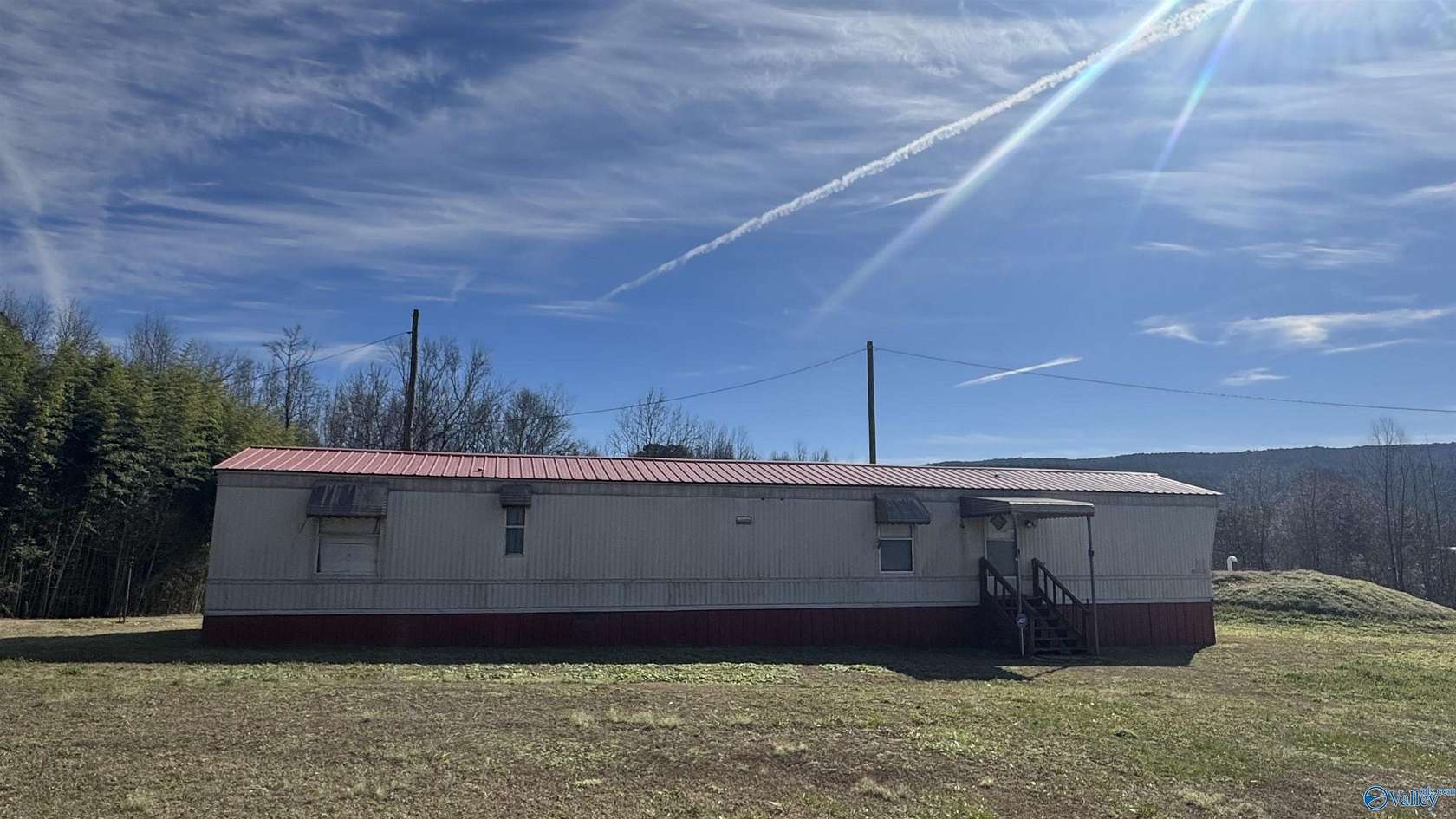 1.57 Acres of Land with Home for Sale in Collinsville, Alabama