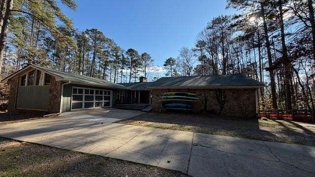 1.9 Acres of Residential Land with Home for Sale in Alpharetta, Georgia