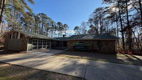 1.9 Acres of Residential Land with Home for Sale in Alpharetta, Georgia