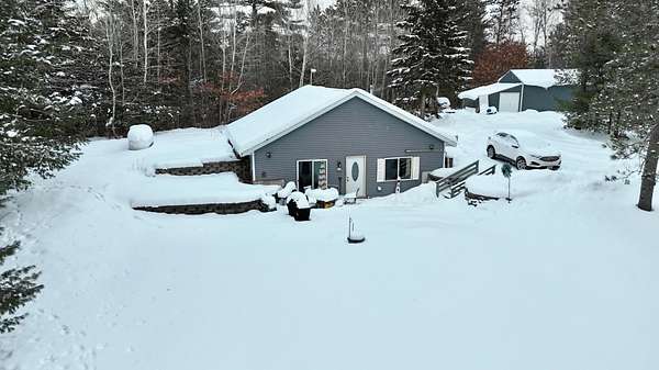 19.9 Acres of Recreational Land with Home for Sale in Tomahawk, Wisconsin