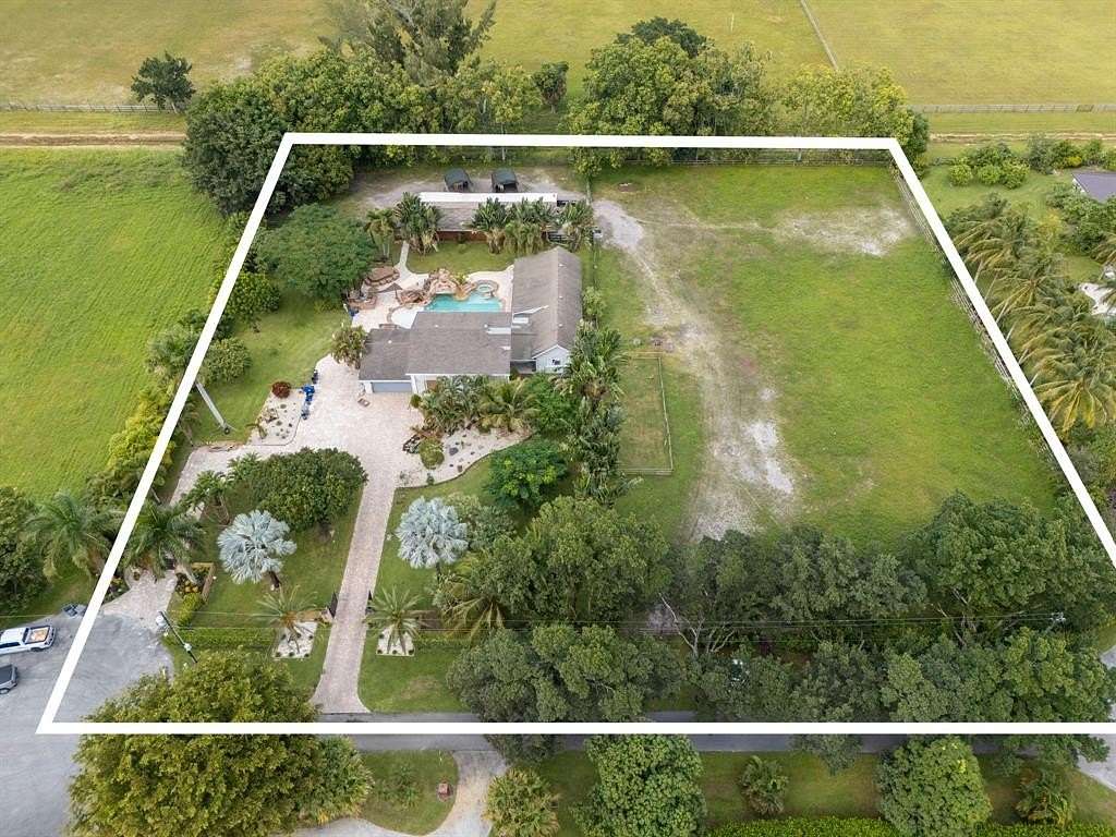 2.5 Acres of Residential Land with Home for Sale in Boca Raton, Florida