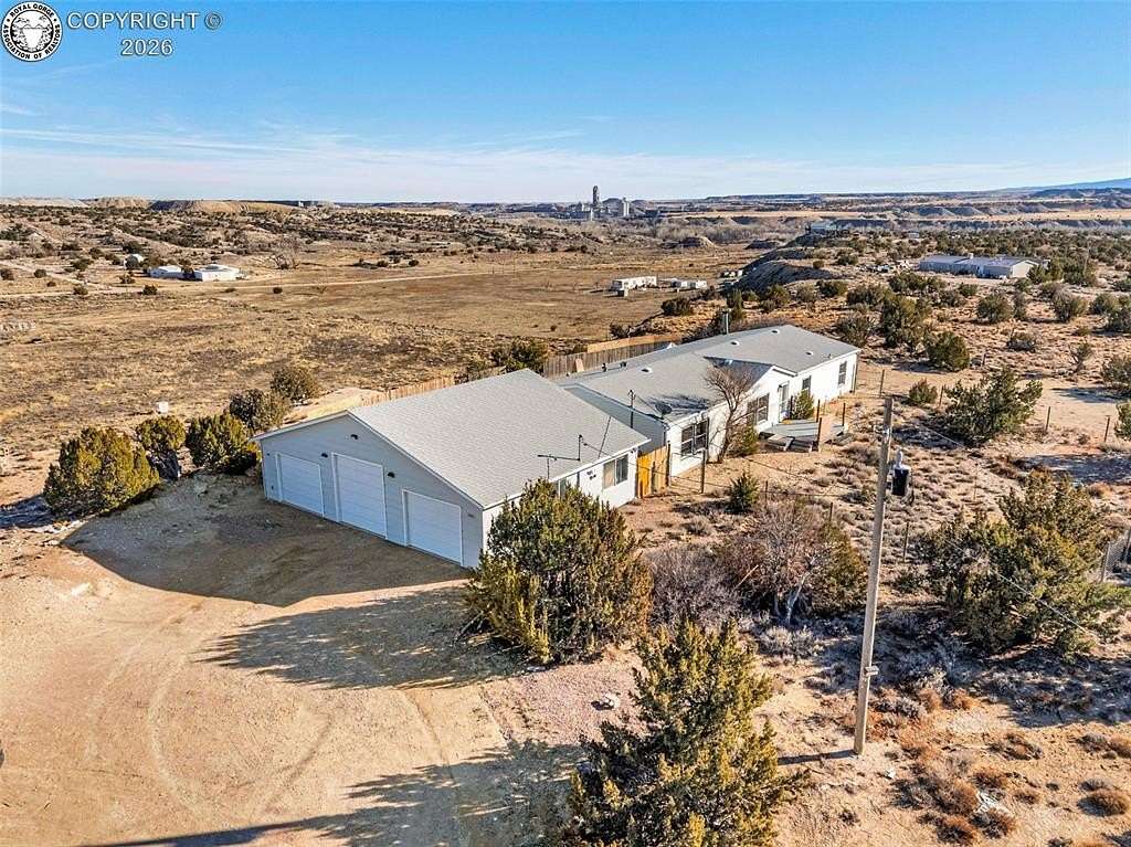 10 Acres of Residential Land with Home for Sale in Penrose, Colorado