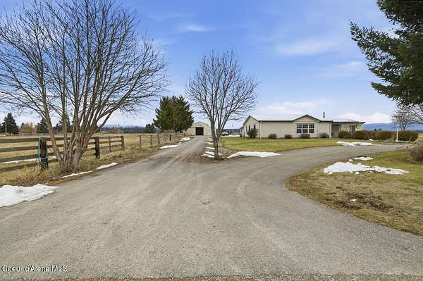 9.16 Acres of Residential Land with Home for Sale in Rathdrum, Idaho