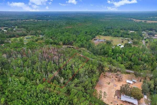 0.89 Acres of Residential Land for Sale in Polk City, Florida