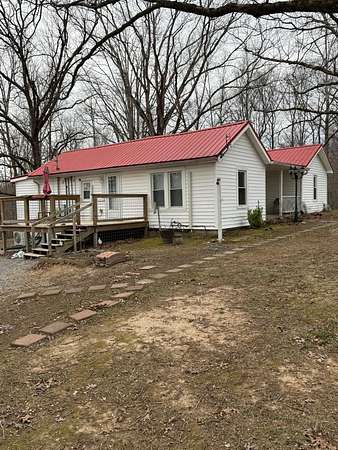 5 Acres of Residential Land with Home for Sale in Charlotte, Tennessee