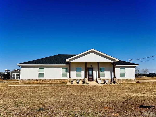 5.38 Acres of Land with Home for Sale in Jay, Florida