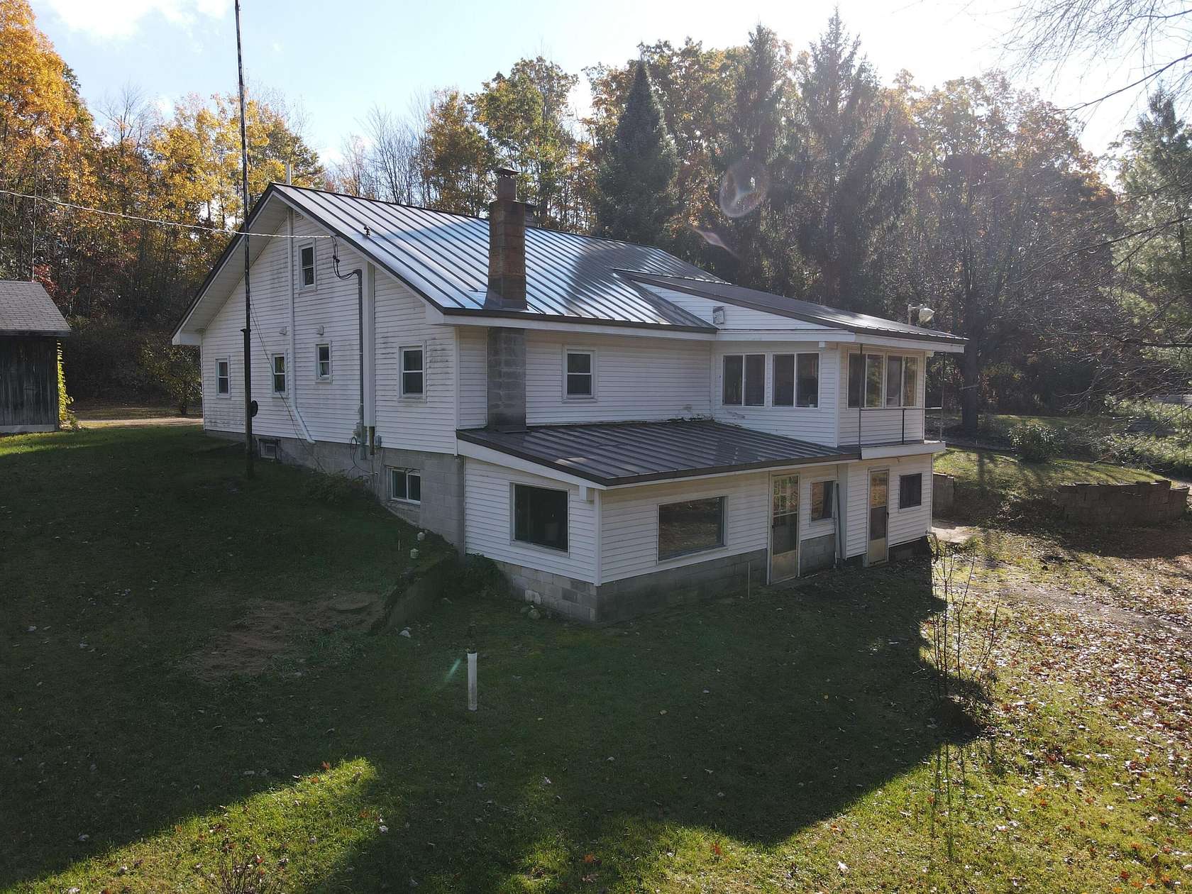 69.8 Acres of Recreational Land with Home for Sale in Harrison, Michigan