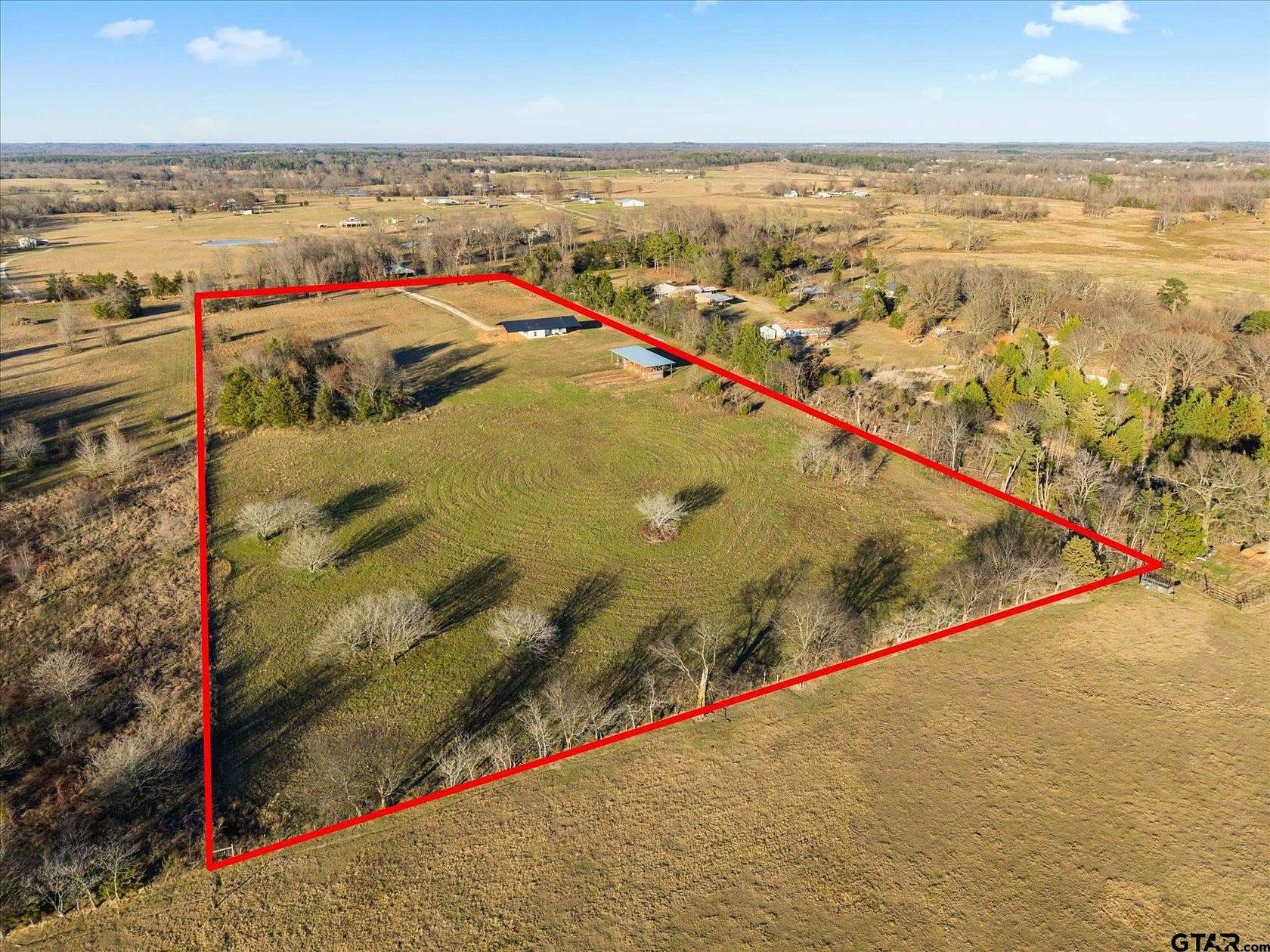 12.7 Acres of Recreational Land with Home for Sale in Mount Pleasant, Texas