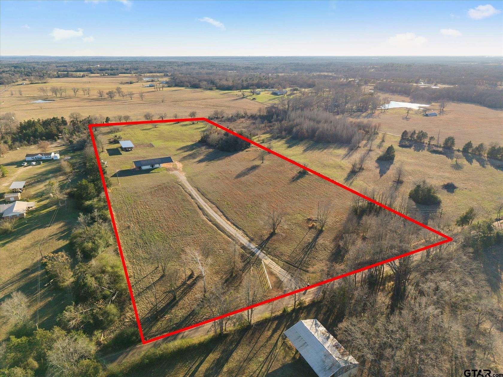 12.7 Acres of Recreational Land with Home for Sale in Mount Pleasant, Texas