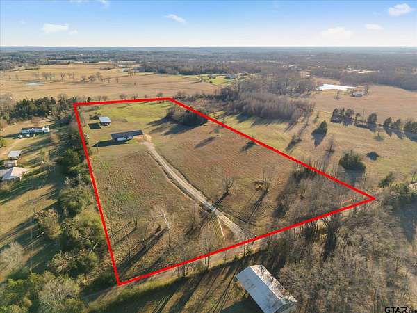 12.7 Acres of Recreational Land with Home for Sale in Mount Pleasant, Texas