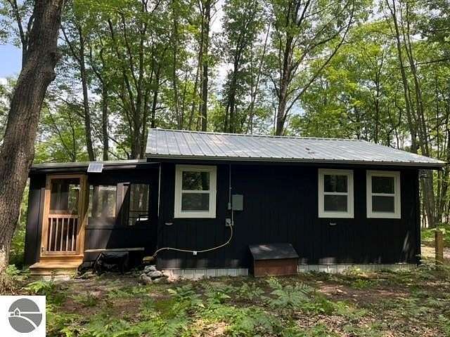 6.15 Acres of Land with Home for Sale in Manton, Michigan