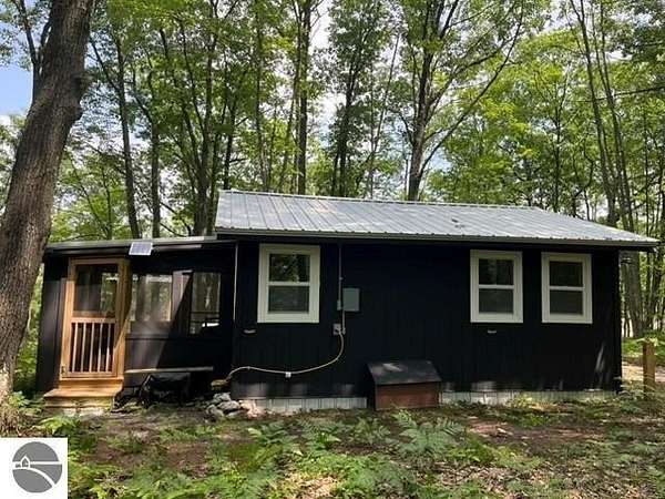 6.15 Acres of Land with Home for Sale in Manton, Michigan