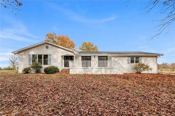 2.88 Acres of Land with Home for Sale in Siloam Springs, Arkansas