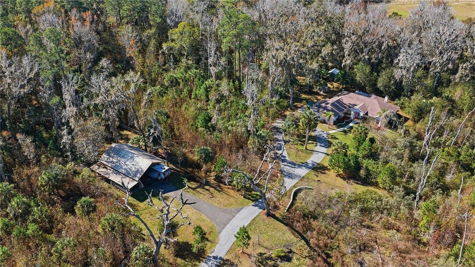 10.3 Acres of Land with Home for Sale in Reddick, Florida