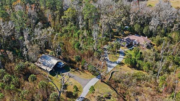 22.2 Acres of Land with Home for Sale in Reddick, Florida
