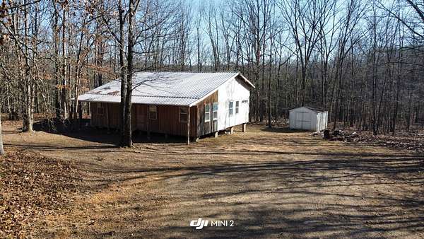 5 Acres of Residential Land with Home for Sale in Ozark, Arkansas