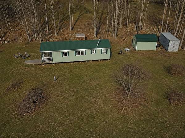 60 Acres of Recreational Land with Home for Sale in Charleston, Maine