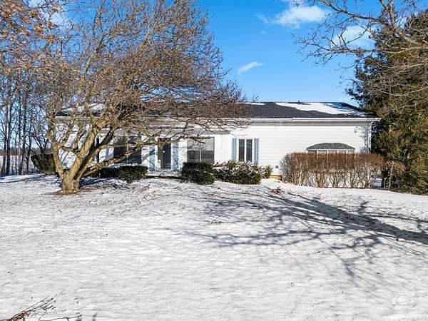 6.54 Acres of Land with Home for Sale in Shelby, Ohio