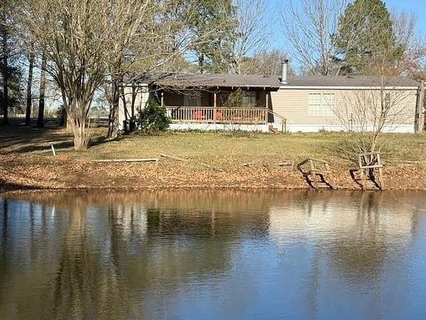 7.43 Acres of Land with Home for Sale in Crockett, Texas