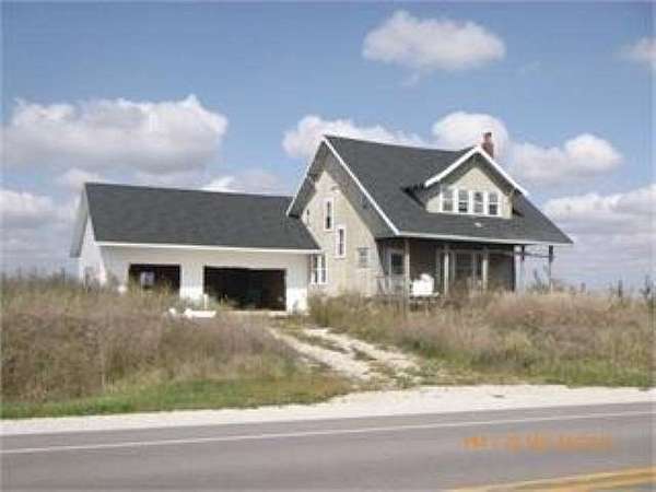 1.72 Acres of Residential Land with Home for Sale in Sigourney, Iowa
