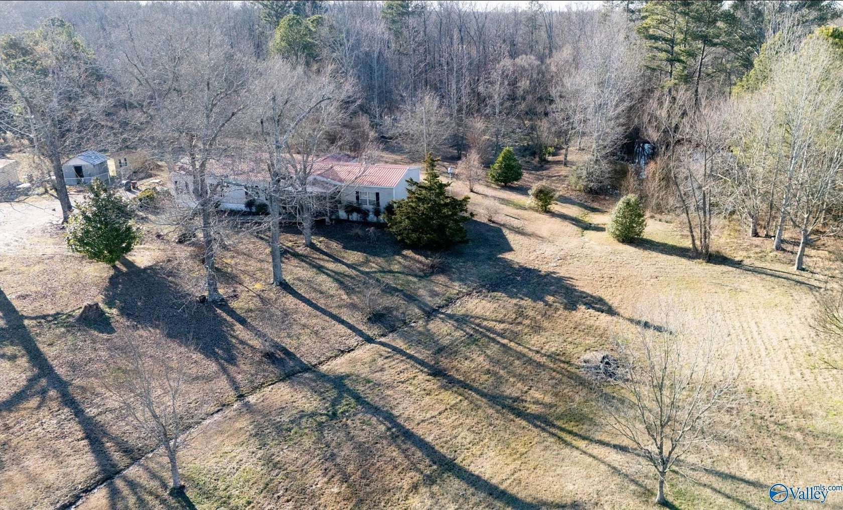 6.6 Acres of Residential Land with Home for Sale in Boaz, Alabama