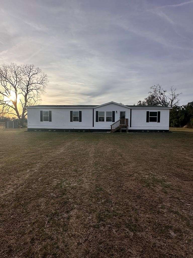 10 Acres of Residential Land with Home for Sale in Bell, Florida