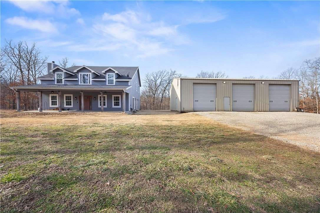 3.16 Acres of Land with Home for Sale in Gravette, Arkansas