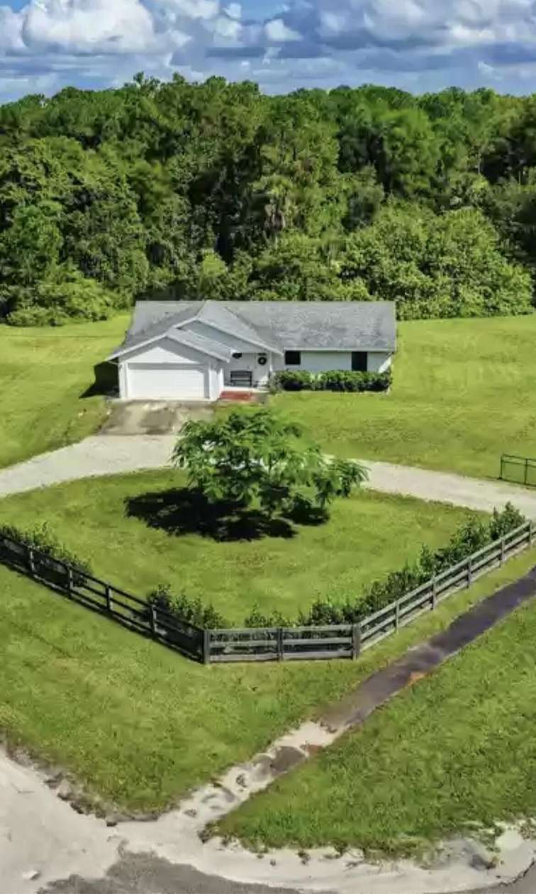 1.53 Acres of Land with Home for Sale in Loxahatchee Groves, Florida