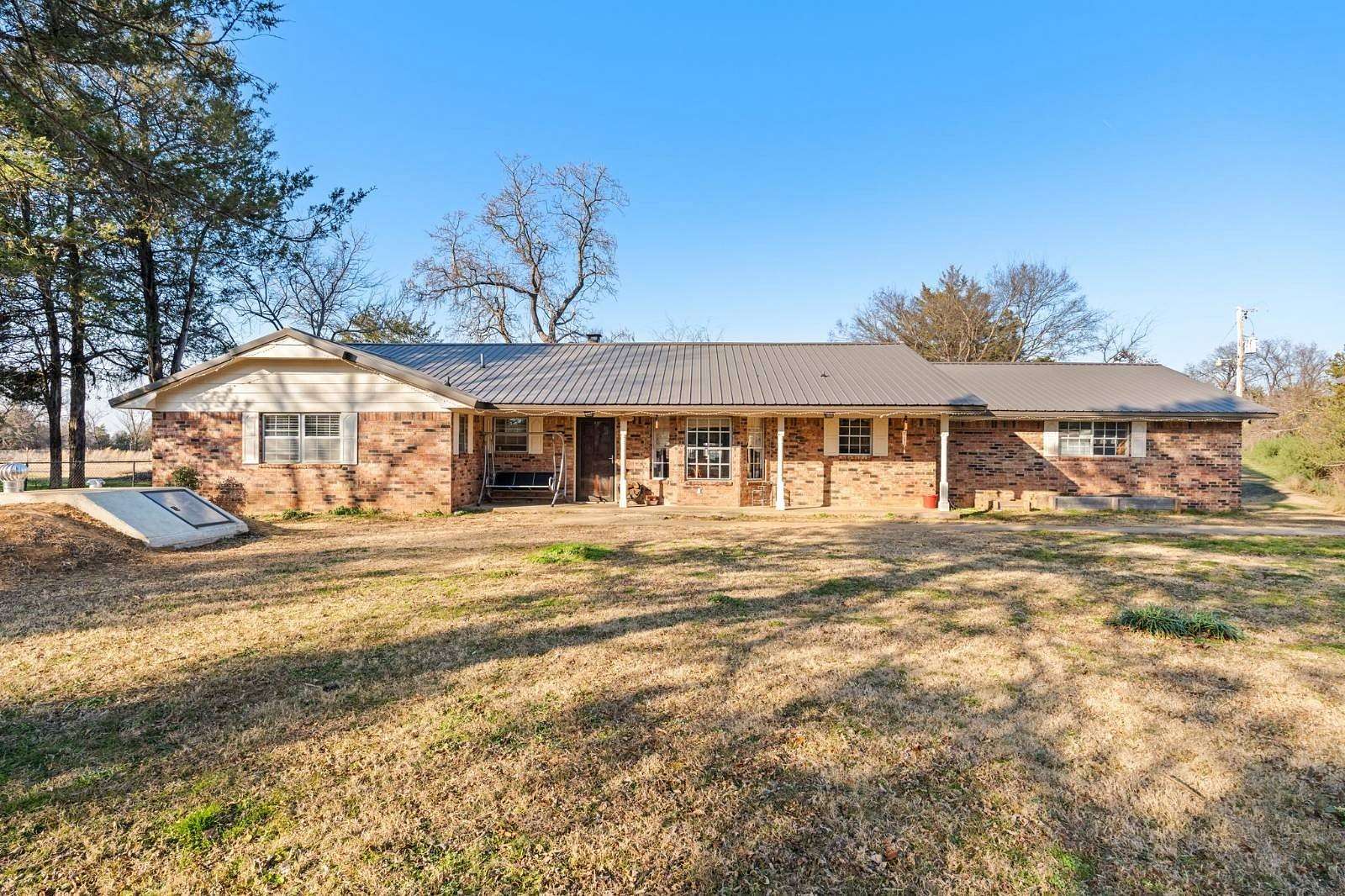 2.35 Acres of Residential Land with Home for Sale in Poteau, Oklahoma