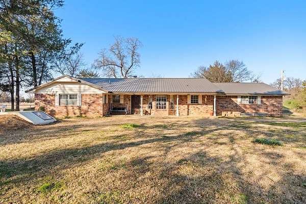 2.35 Acres of Residential Land with Home for Sale in Poteau, Oklahoma