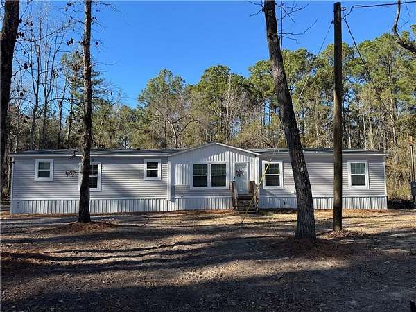 3 Acres of Residential Land with Home for Sale in White Oak, Georgia